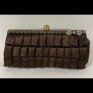 Ruffled satin clutch with chain strap